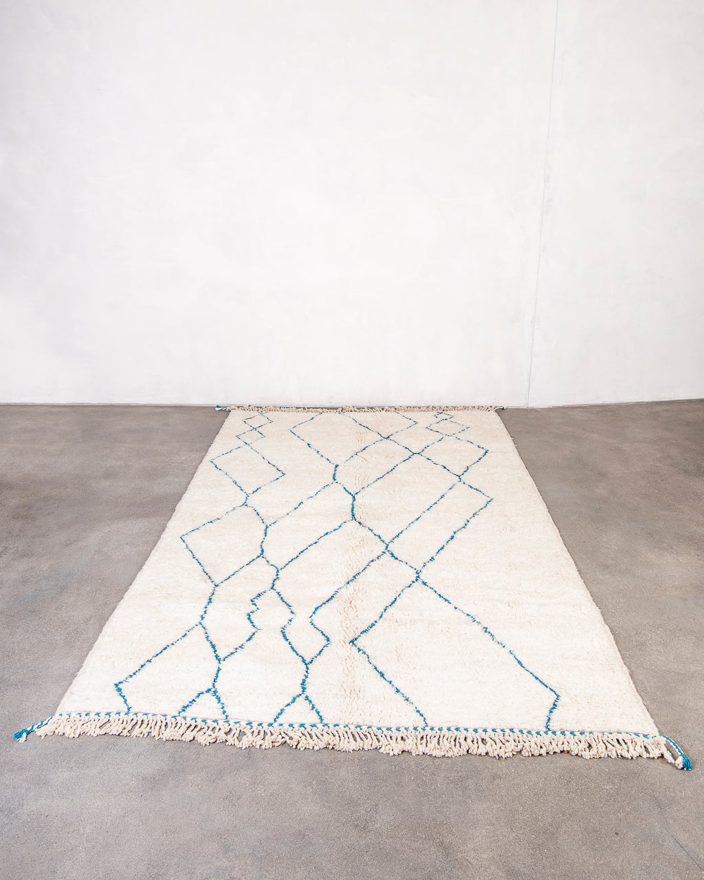 Modern, designer, handcrafted Berber rug from Morocco. Beniourain carpet with beautiful colors and patterns and fluffy wool texture.
